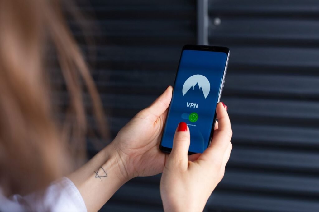 Woman using one of the best VPN services on her smartphone